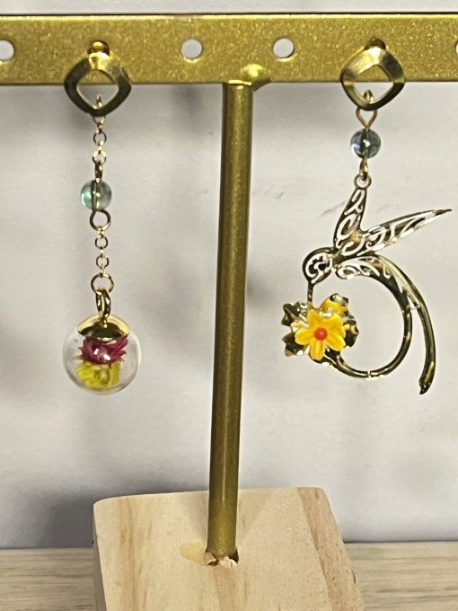 Boucles d'oreilles colibri asymétriques dorées