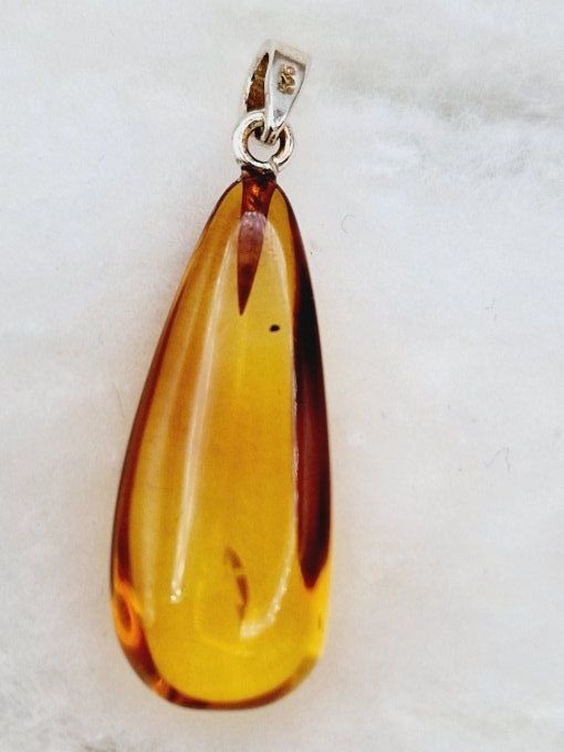 Pendentif en ambre doré et argent 925