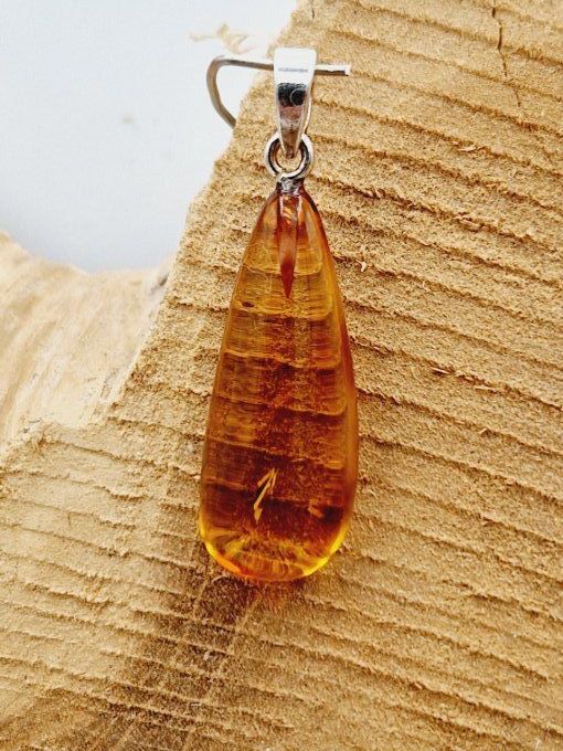 Pendentif en ambre doré et argent 925