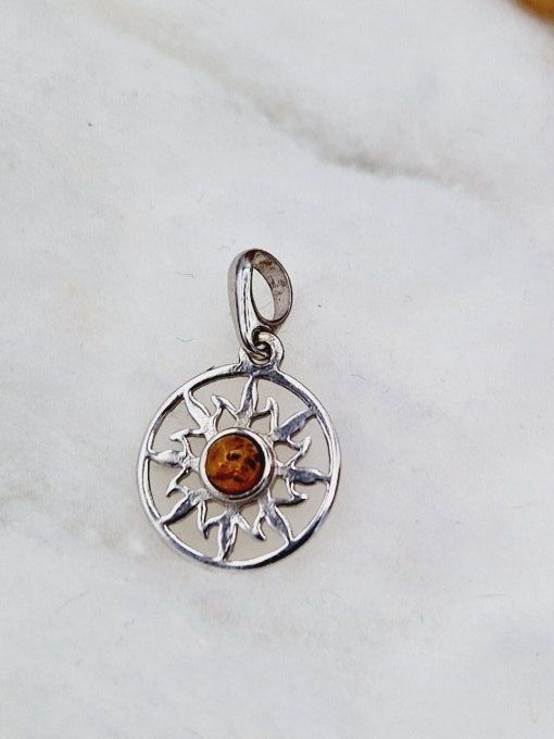 Pendentif soleil en ambre doré et argent 925 