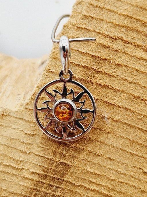 Pendentif soleil en ambre doré et argent 925 