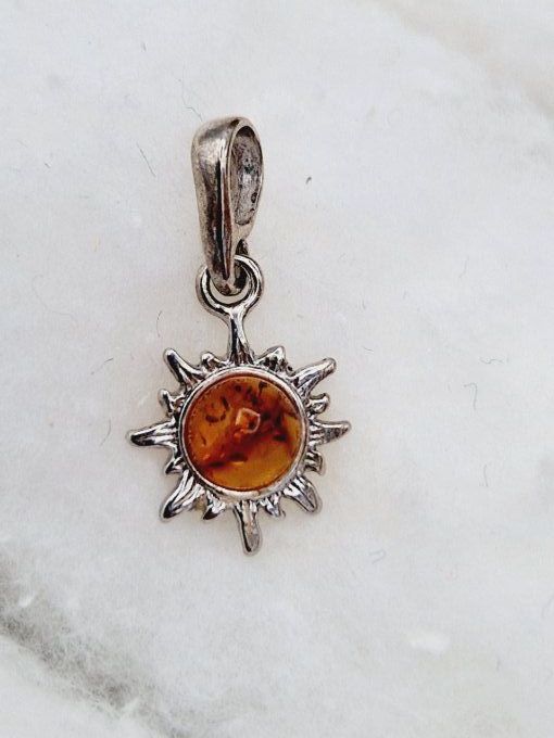 Pendentif soleil en ambre doré et argent 925 